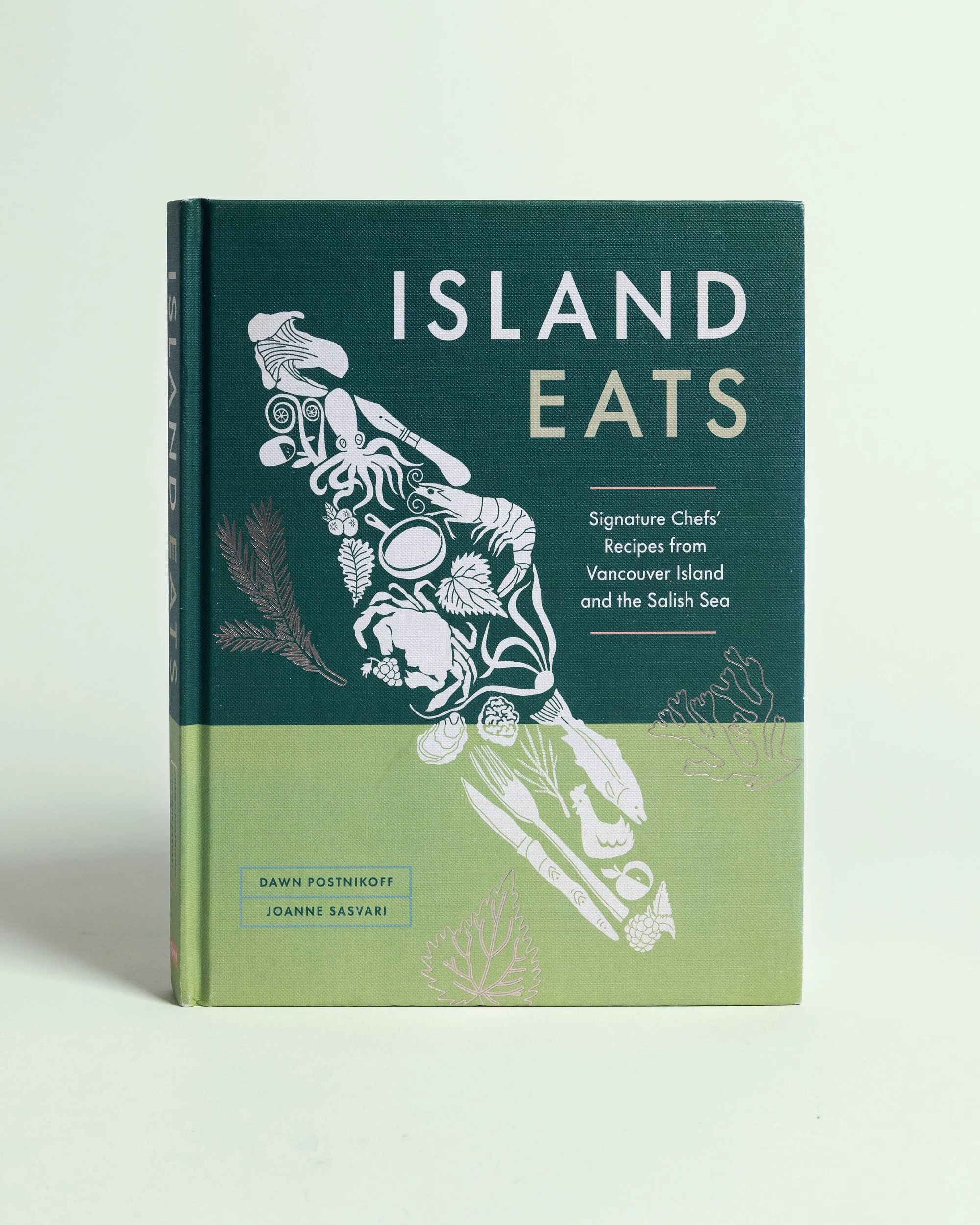 Island Eats cookbook cover design by DSGN Dept featuring illustrated seafood and produce artwork on teal and green background