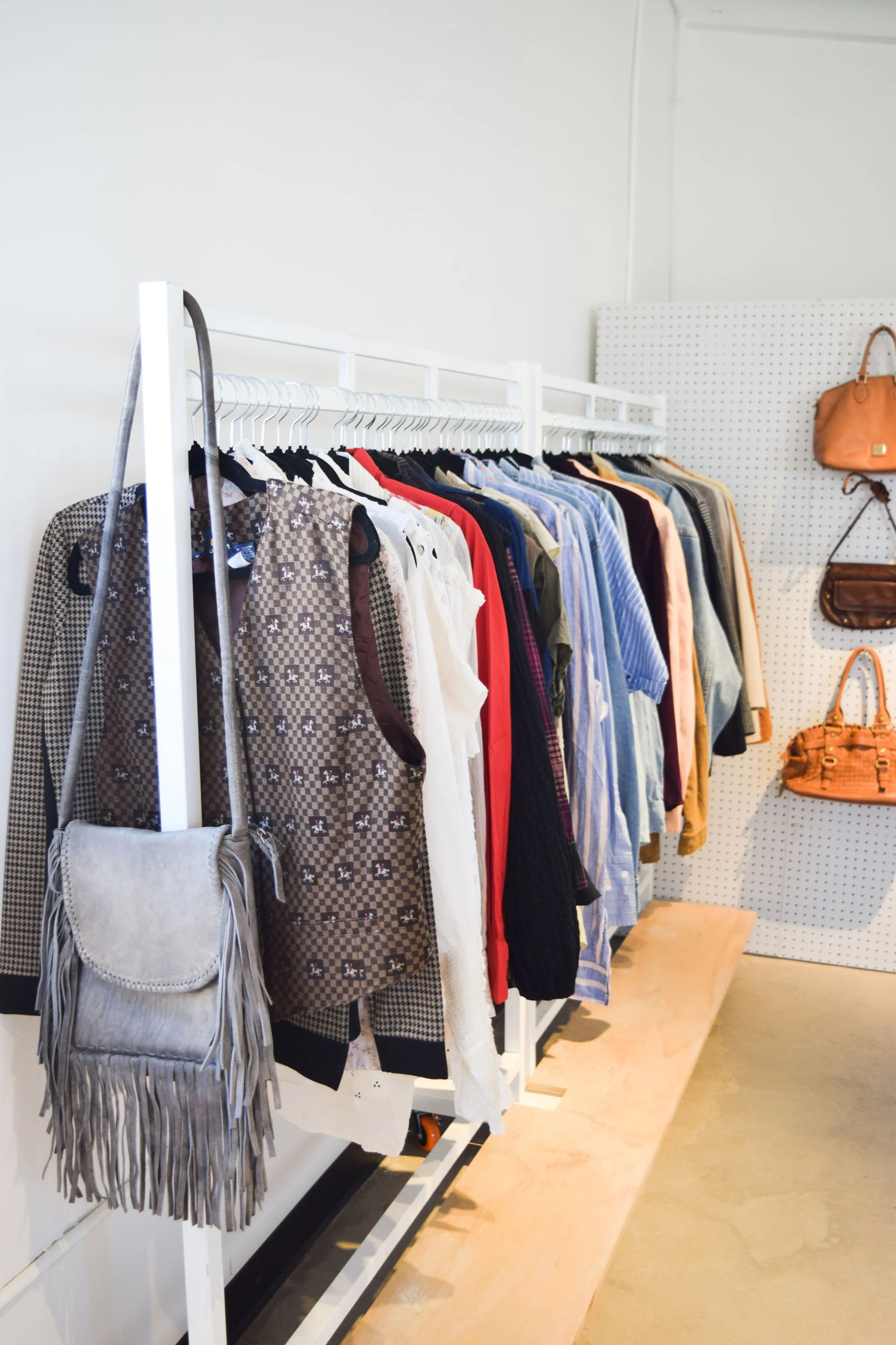 Rack of designer clothing at The Pearl