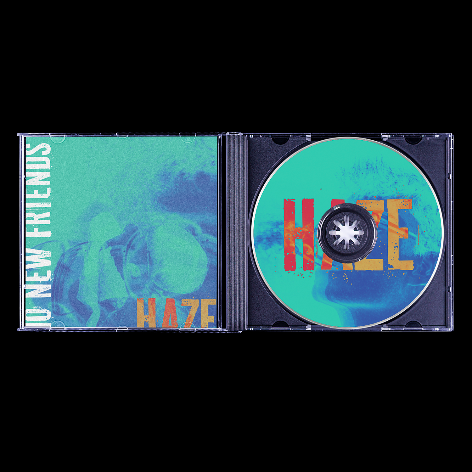 Open CD case displaying the album cover and disc for Haze. The cover features a stylized skull illustration and the word 'HAZE' in bold, distressed letters, with a gradient blue and green background.