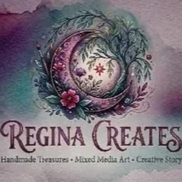 A circular artwork featuring a crescent moon, floral designs, and swirling patterns in pastel colors. Below, the text reads 'Regina Creates' with a subtitle 'Handmade Treasures - Mixed Media Art - Creative Story'.