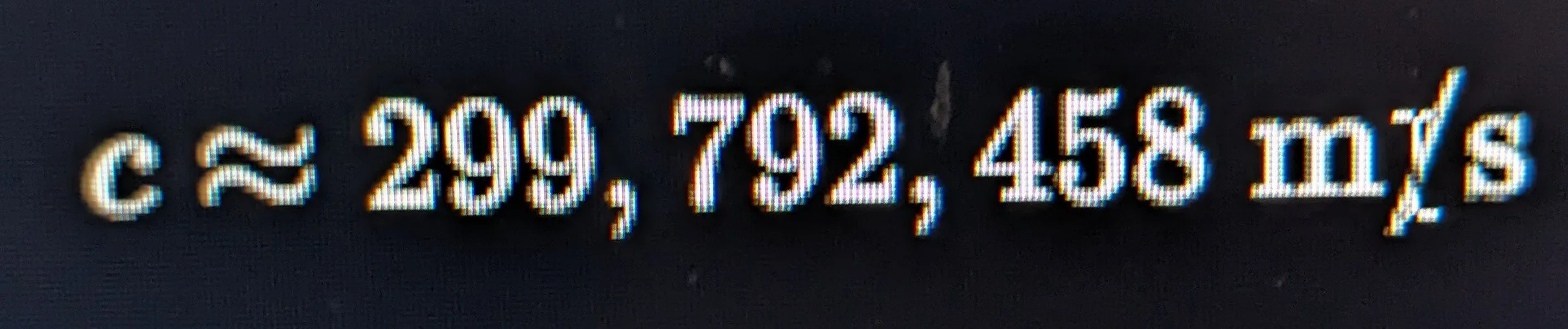 Close-up of a digital display showing the technical data: 'C&E 200, 192, 45, 1/5, inS'.