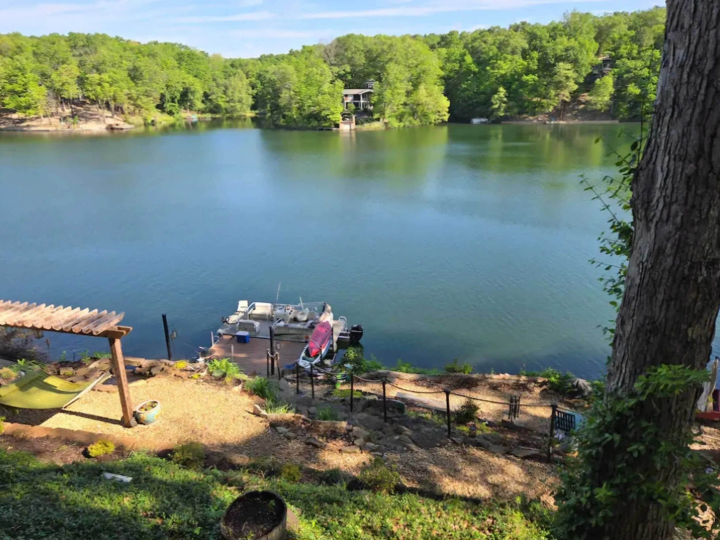 View of Lake Avalon and hte private dock from The Green Door lakeside retreat.
