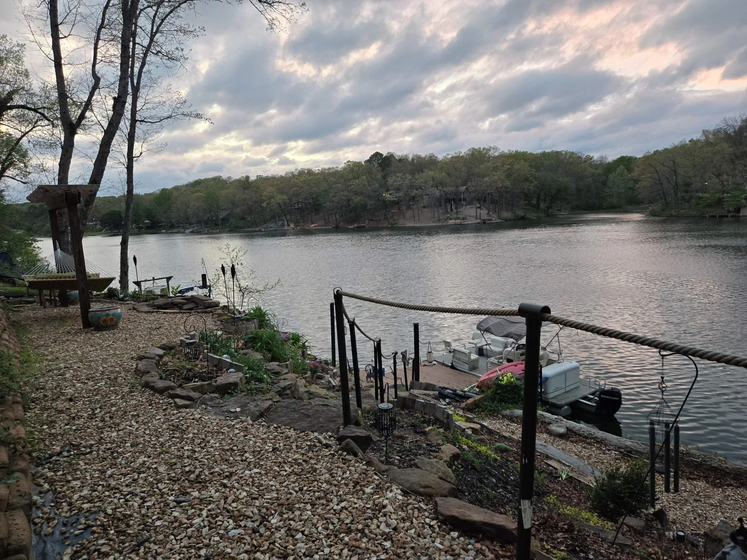 Stone steps leading down to the dock and lake at The Green Door on Lake Avalon.