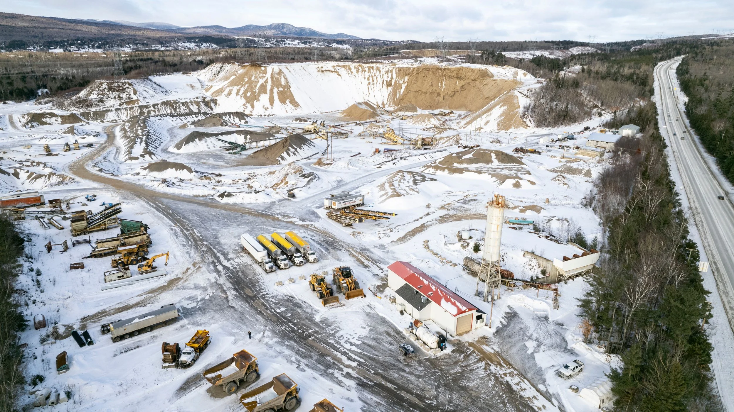 Aerial shot of a mining operation during winter