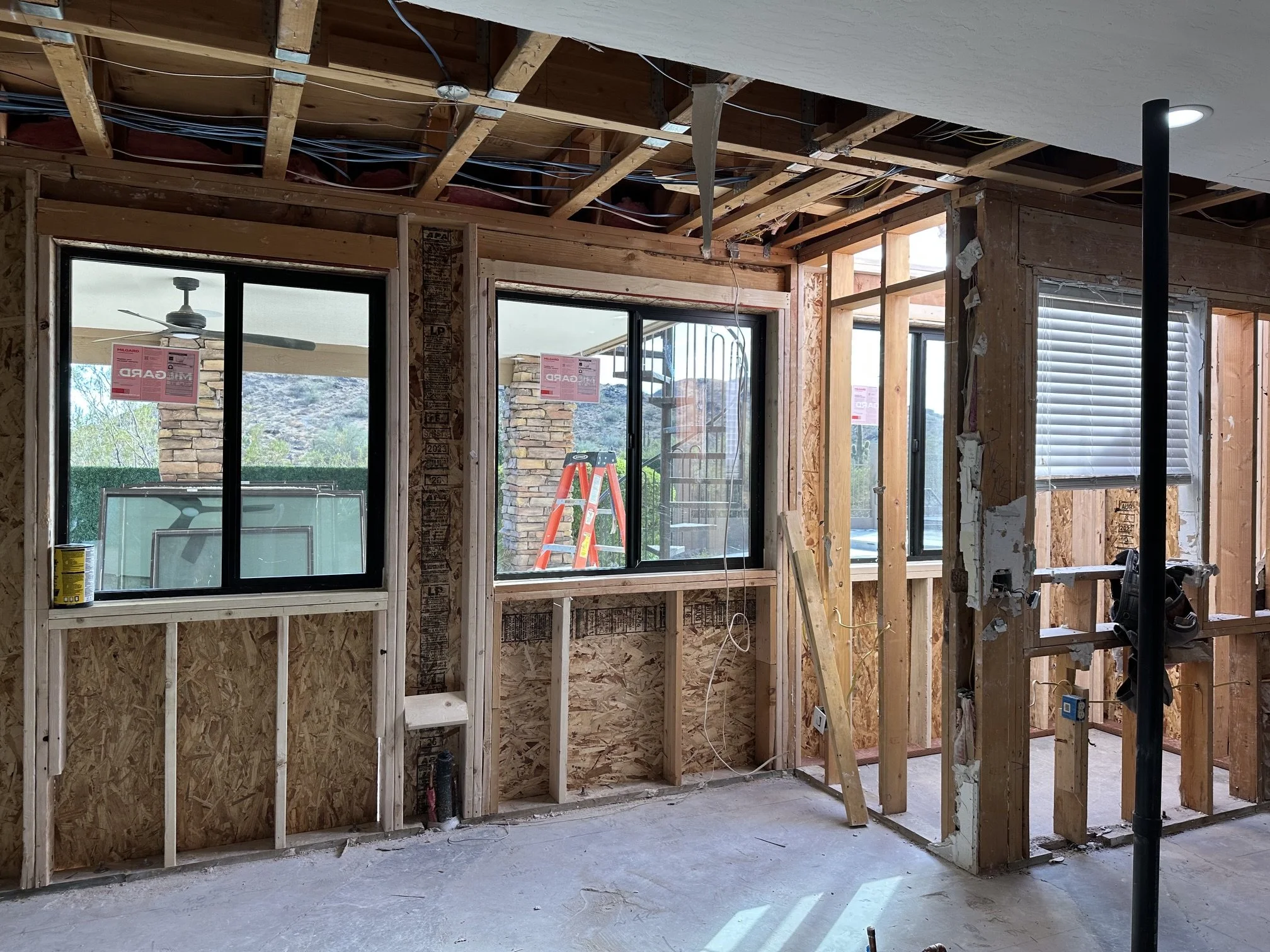 Addition of Larger Kitchen Windows along the perimeter- During