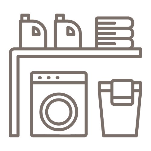 Laundry room with detergent bottles, folded towels, washing machine, and a laundry basket.