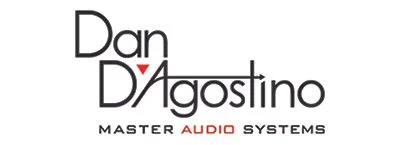 Logo for Dan D'Agostino Master Audio Systems with stylized text and a small red triangle