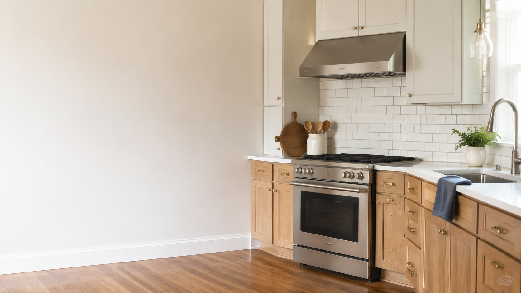Detailed freshly cleaned kitchen with clean cabinet fronts, backsplash, appliances, baseboards, and floor edges.