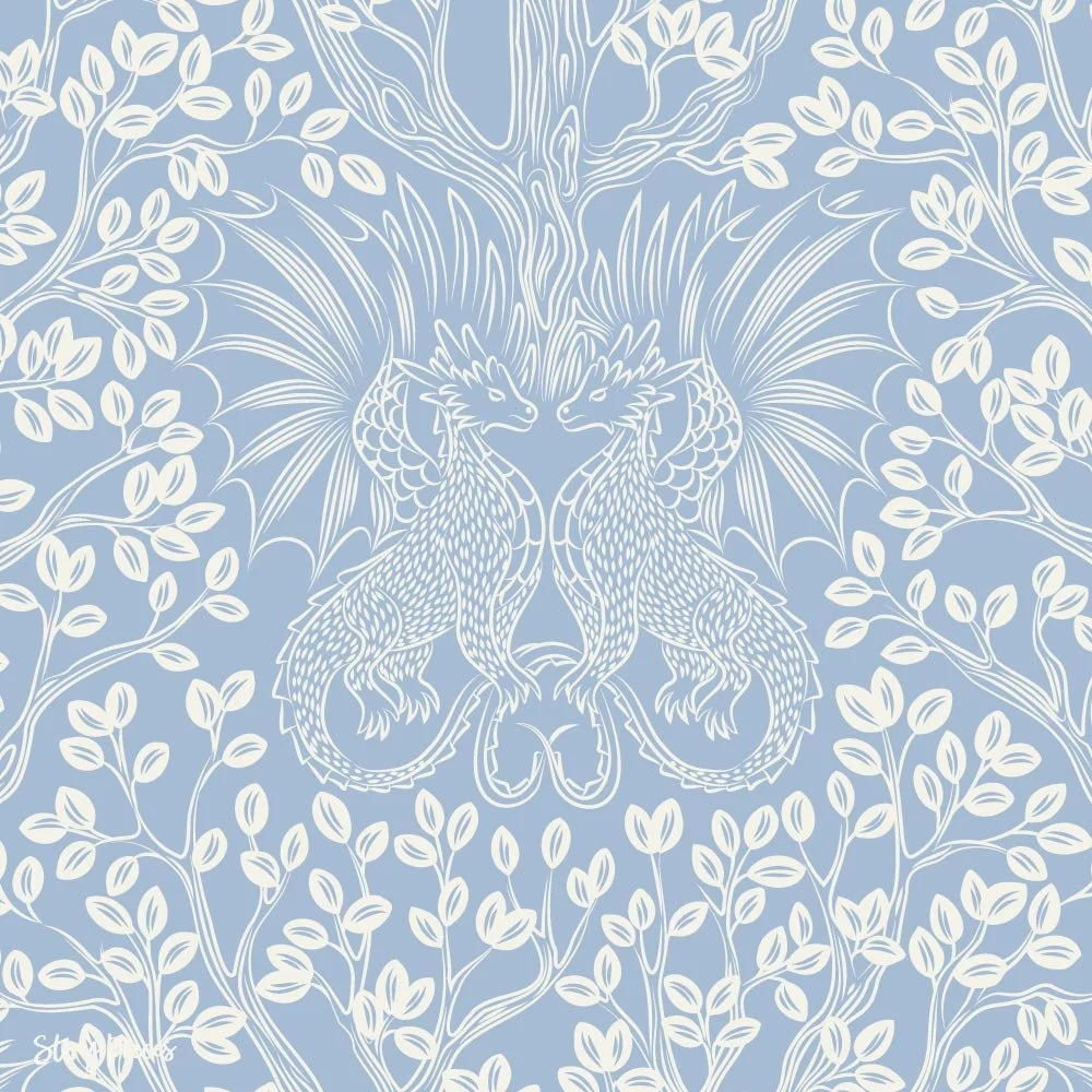 Children’s fantasy wallpaper with mirrored dragons and leafy trees in a soft blue palette, storybook-inspired surface pattern design.