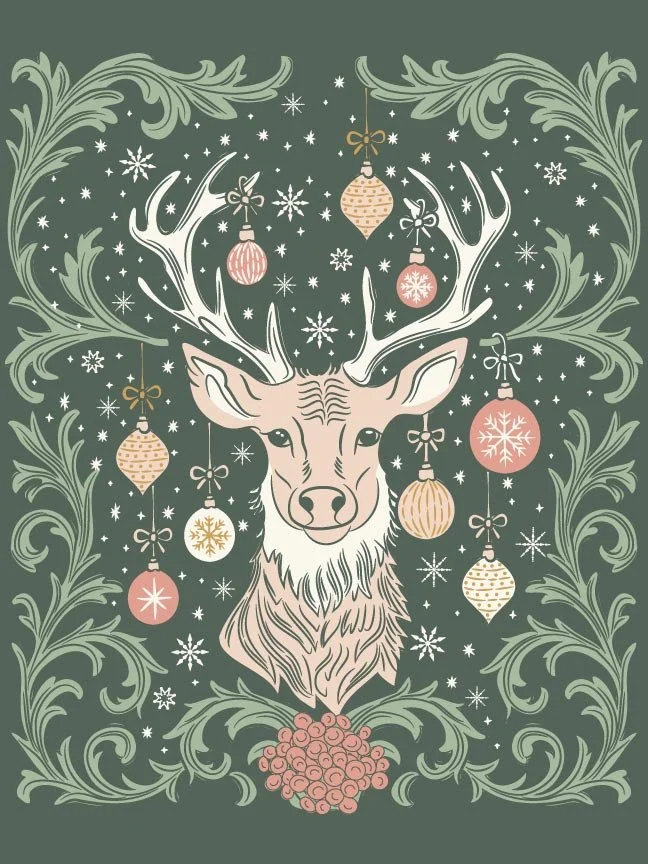 A decorative Christmas illustration of a stag’s head with branching antlers adorned with hanging ornaments, surrounded by snowflakes and framed by ornate scrolling foliage, in soft green, blush pink, and gold tones on a deep green background.