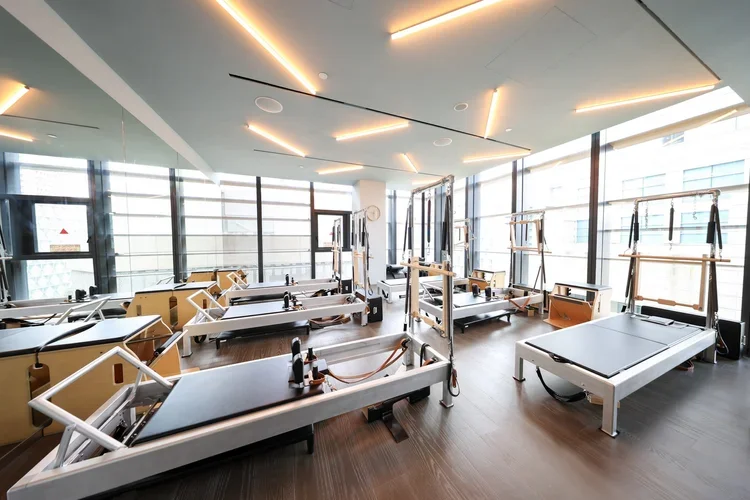 SCA Pilates studio at OUE Downtown Singapore with Coach Poppy