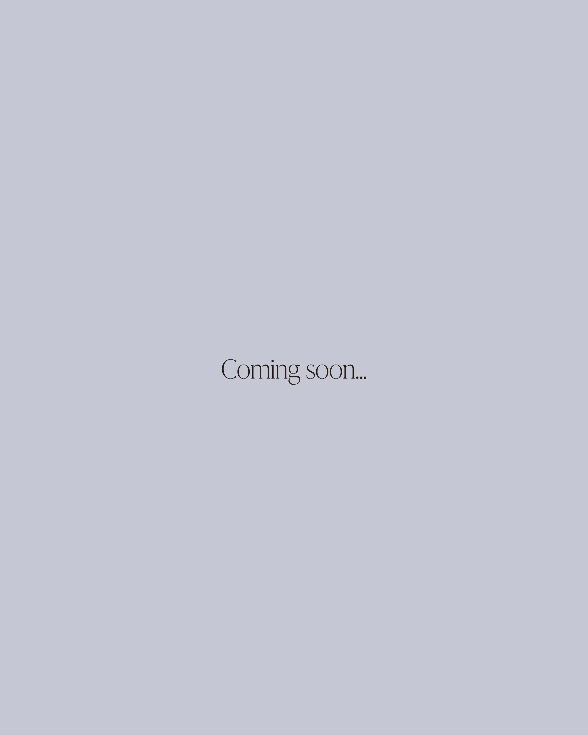 A light blue background with the text "Coming soon..." centered in black