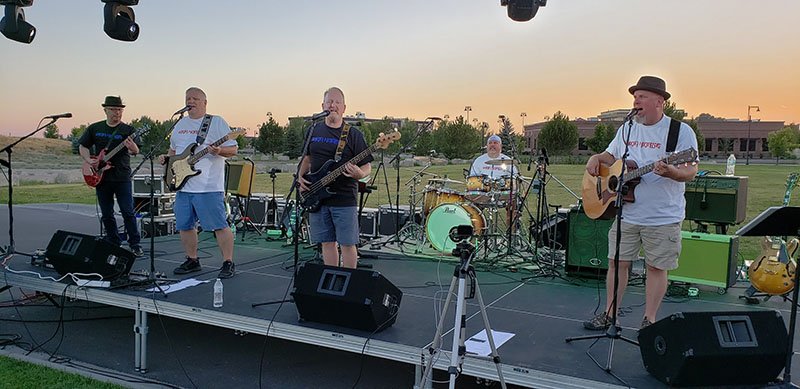 Blaine playing guitar in Iron Horse at the reunion show