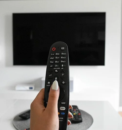 Control4 remote controlling lights, sound and video