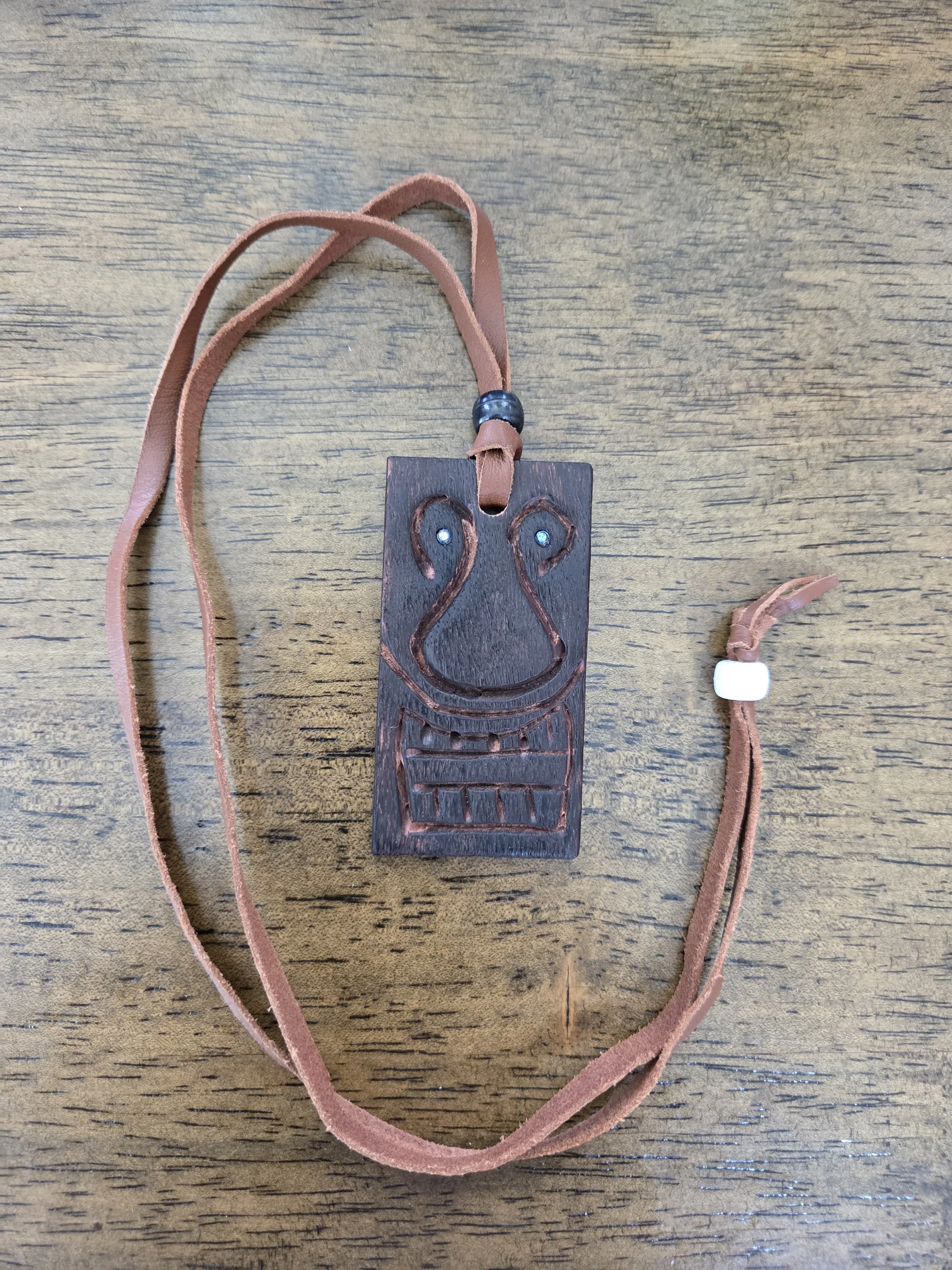 Māori-Inspired Spirit Face – Eucalyptus Pendant