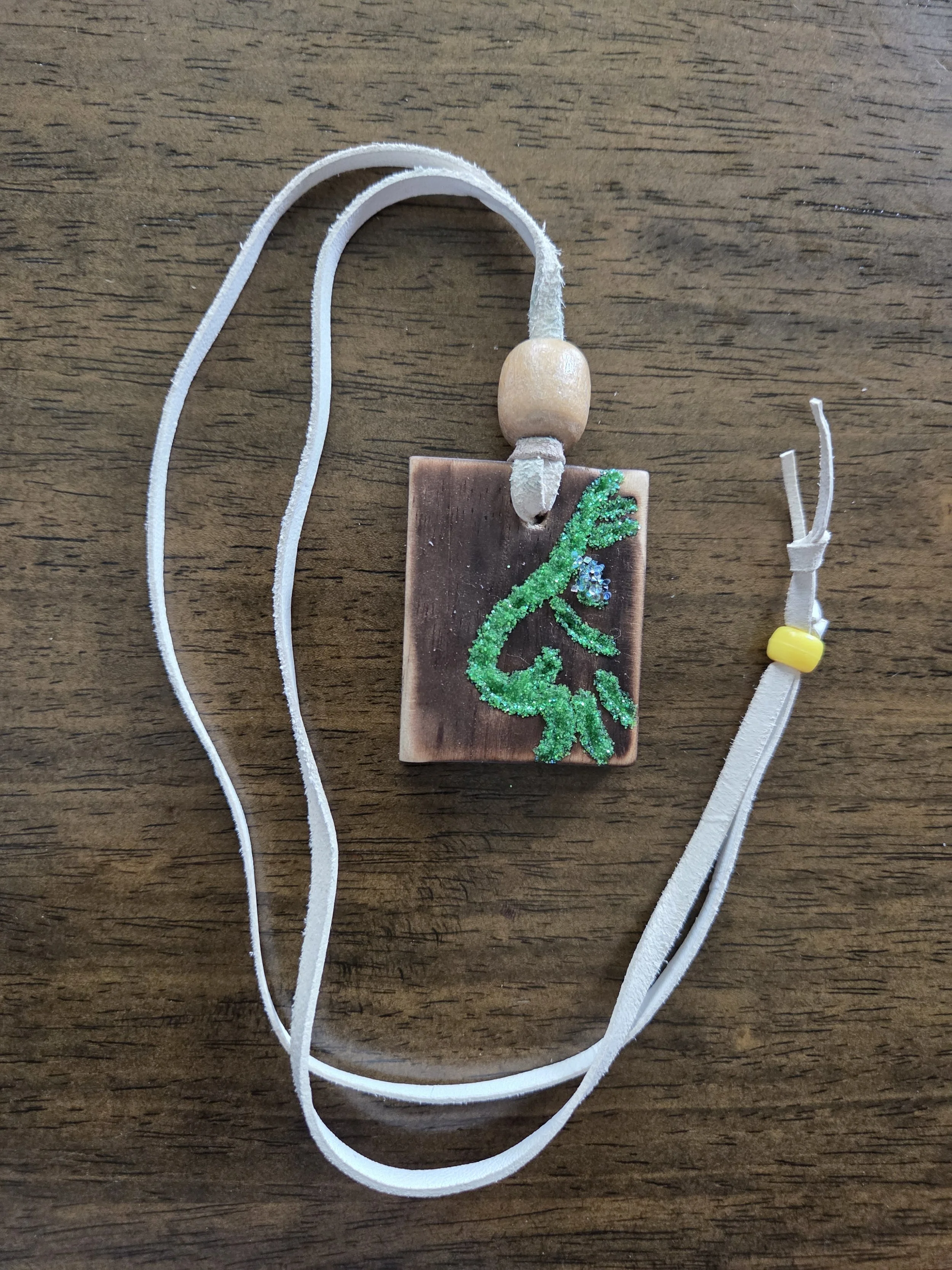 Glowing Wood Spirit – Hand-Carved Pine Pendant
