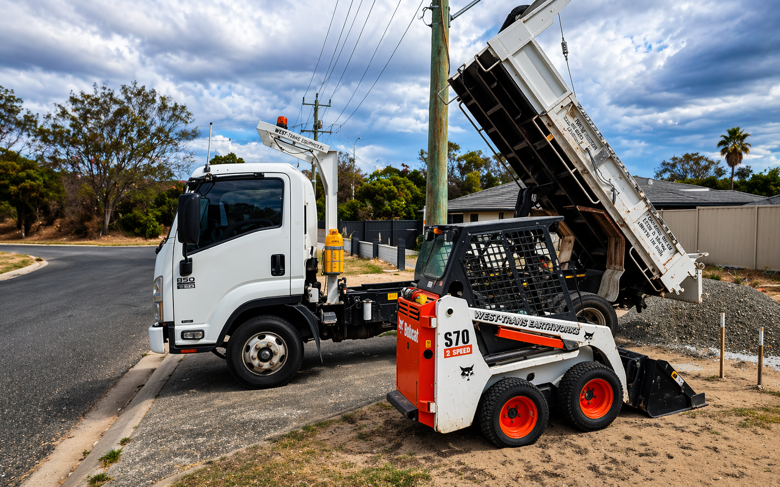 Construction vehicles on suburban street.png