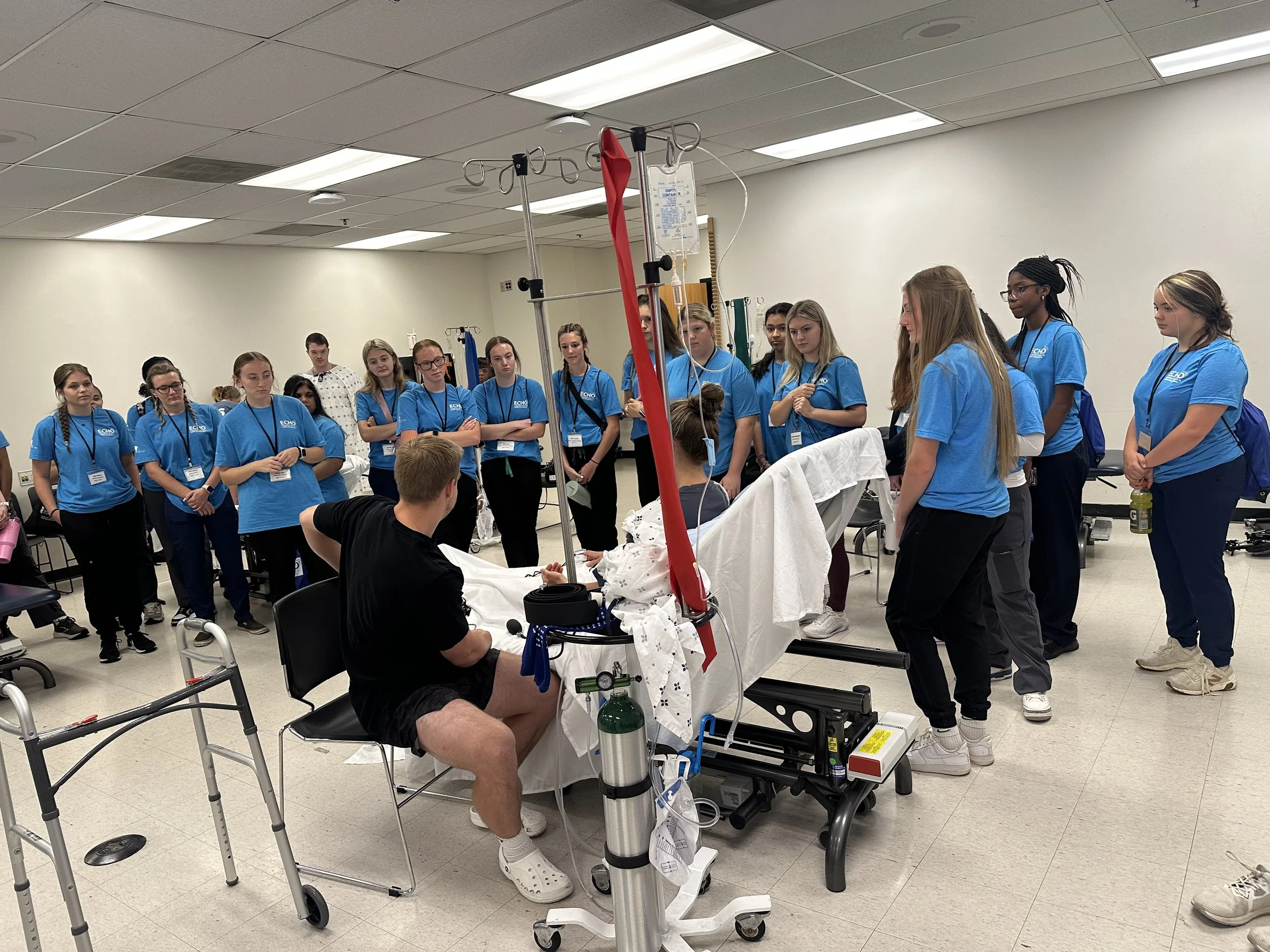 ECHO students observing a physical therapy demonstration