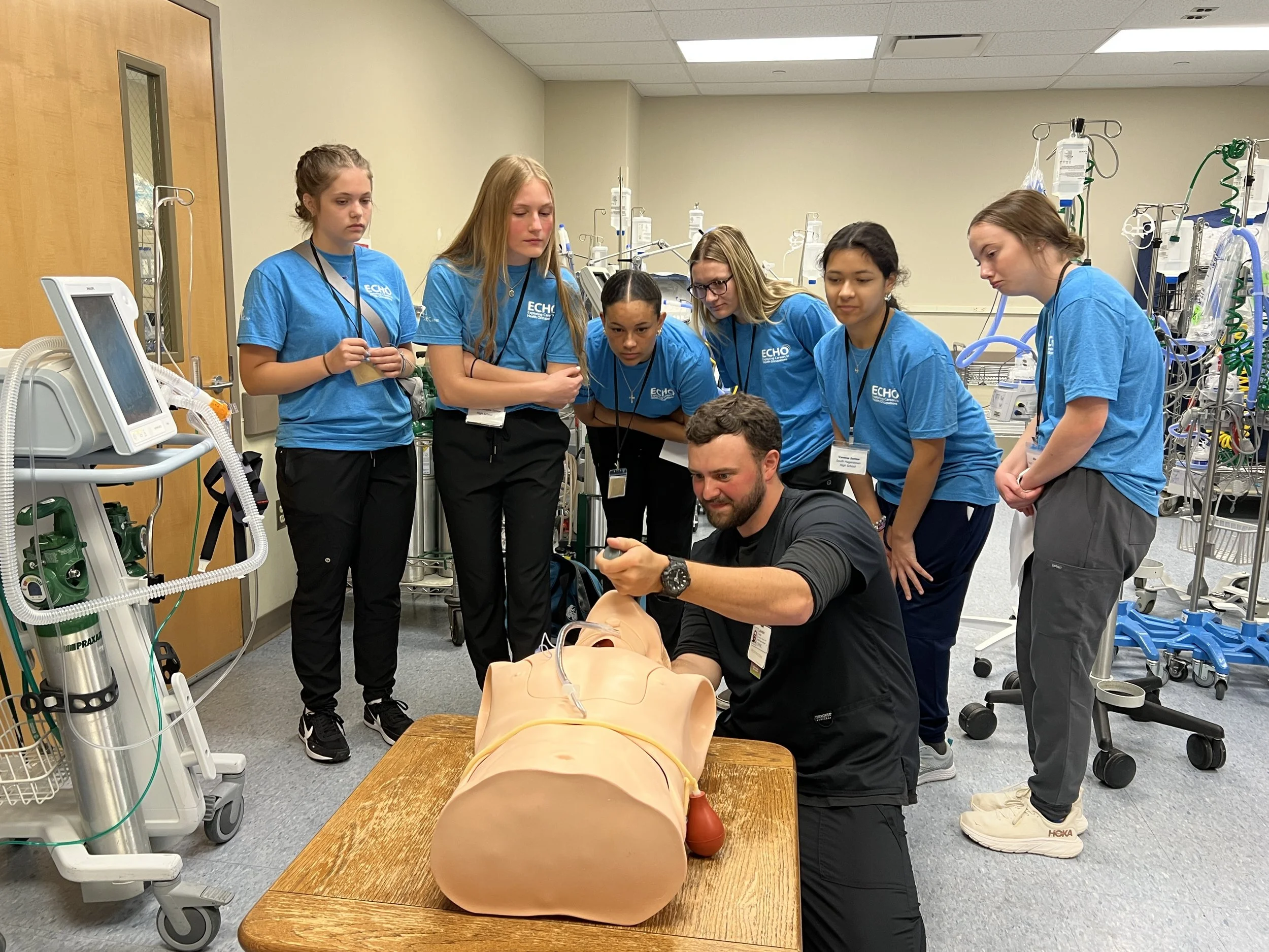 ECHO students observing a medical demonstration