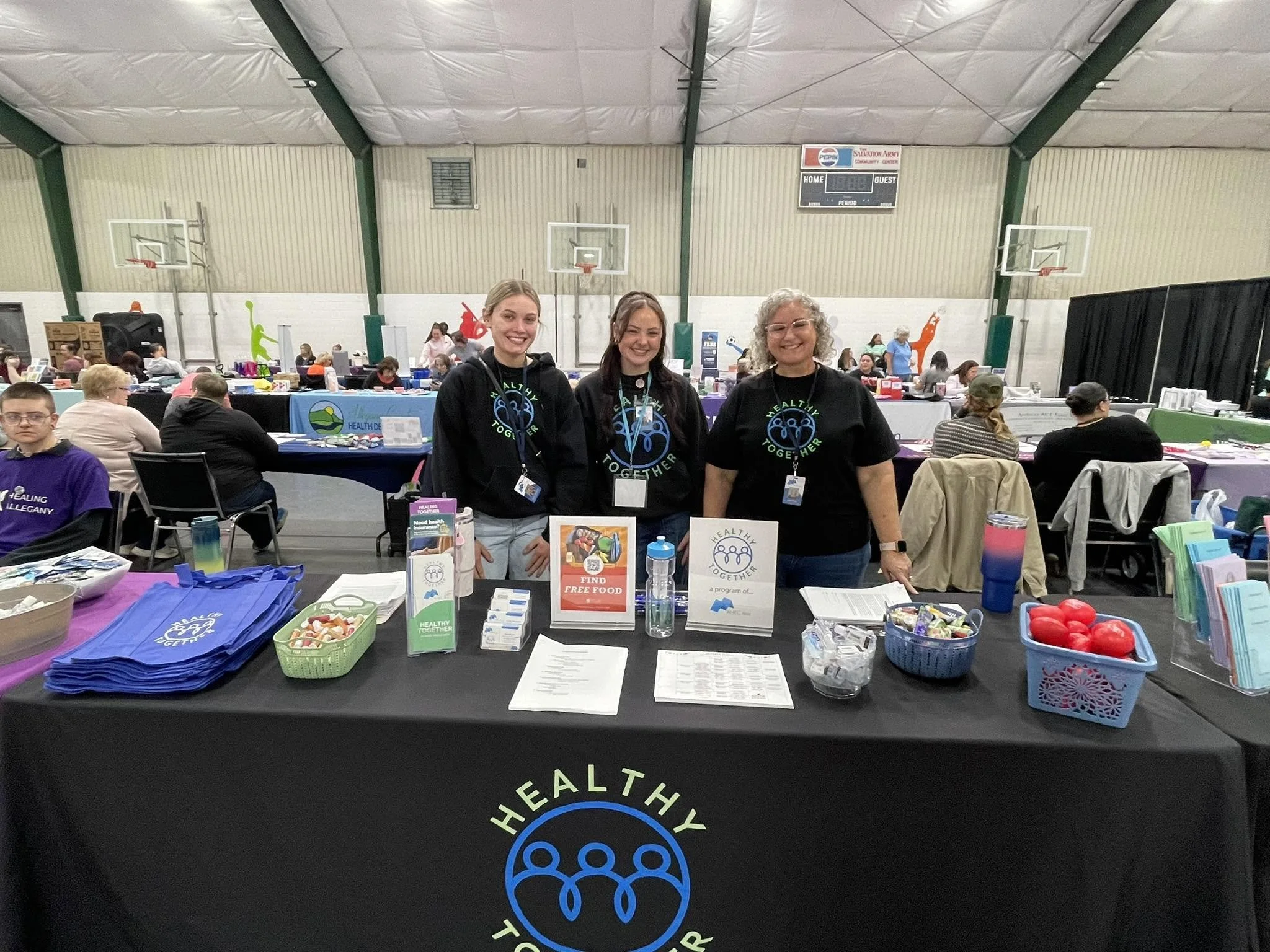 Healthy Together outreach table at community event