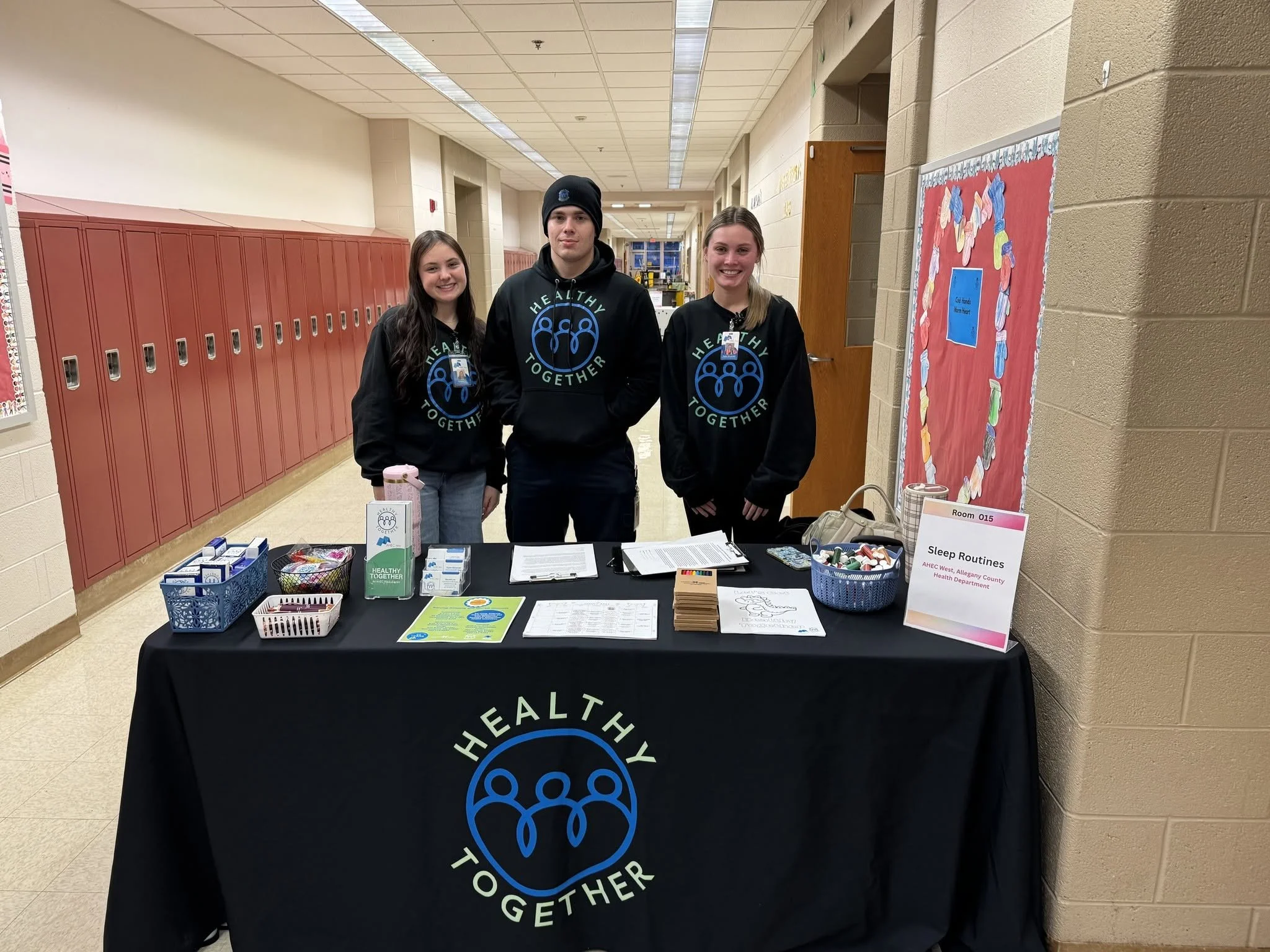 Healthy Together outreach table in school hallway