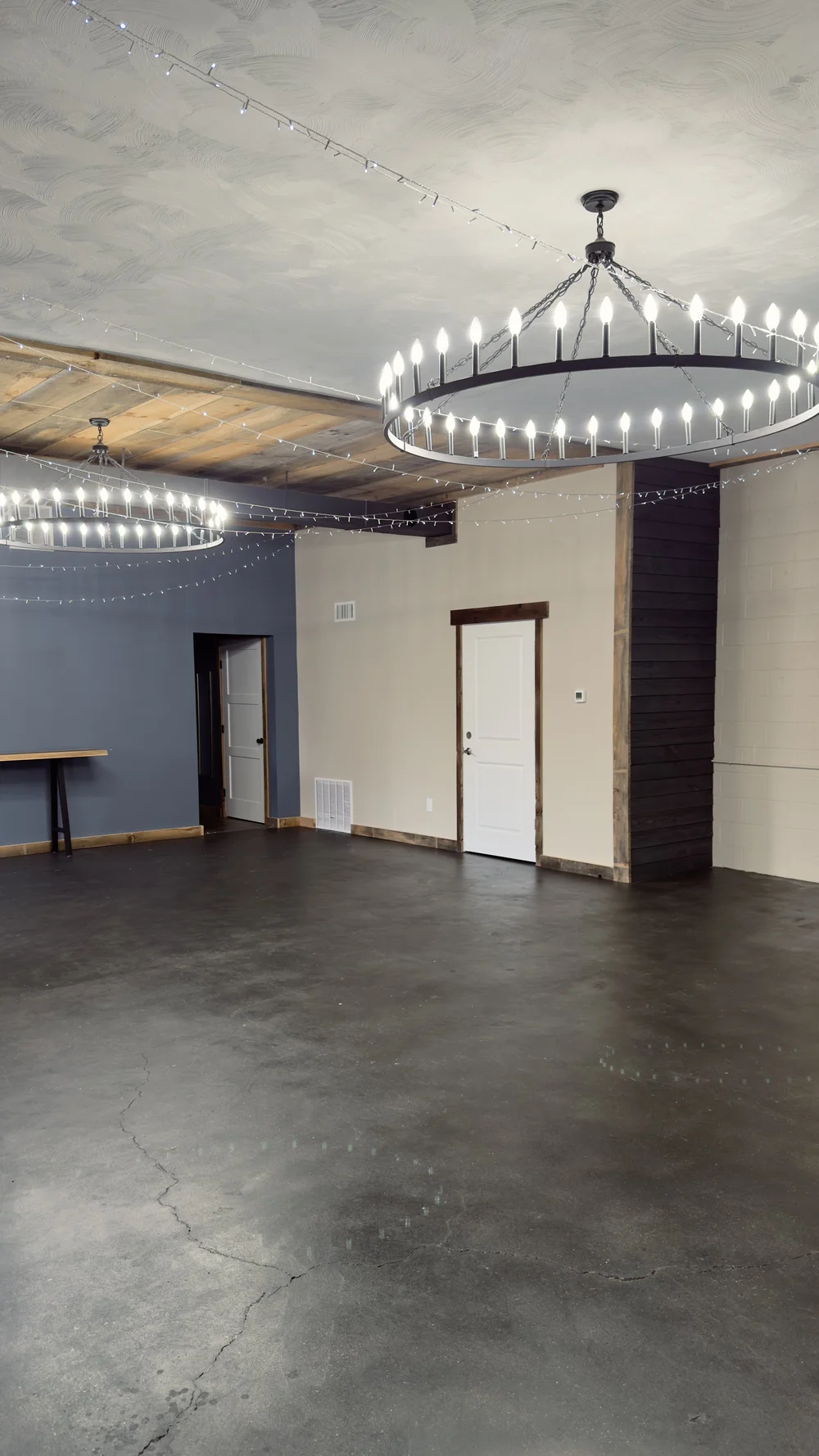 Event hall with circular candle chandeliers