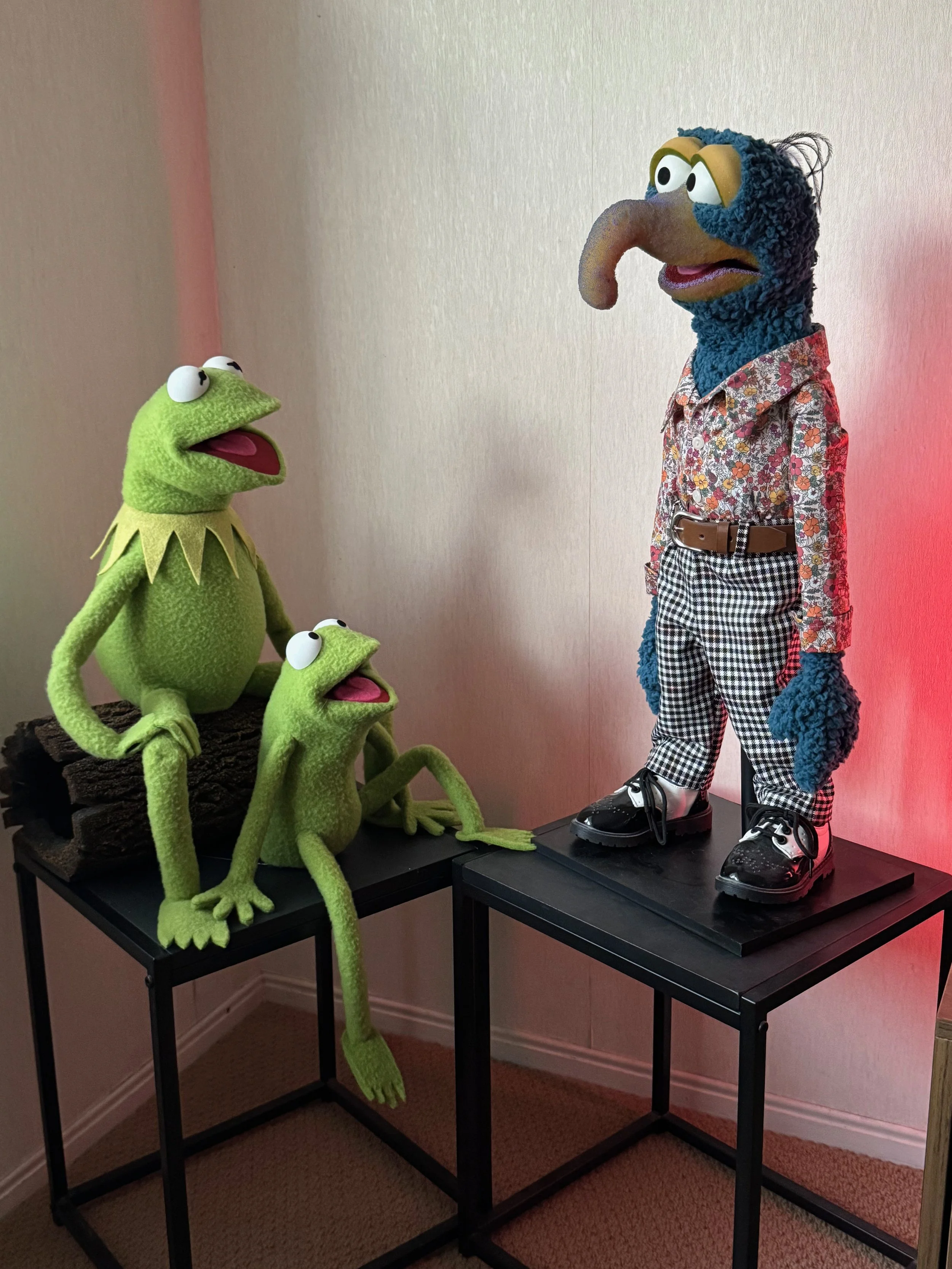 Three replica puppets from The Muppets built by Paul Lewis: Kermit the Frog, Robin, and Gonzo
