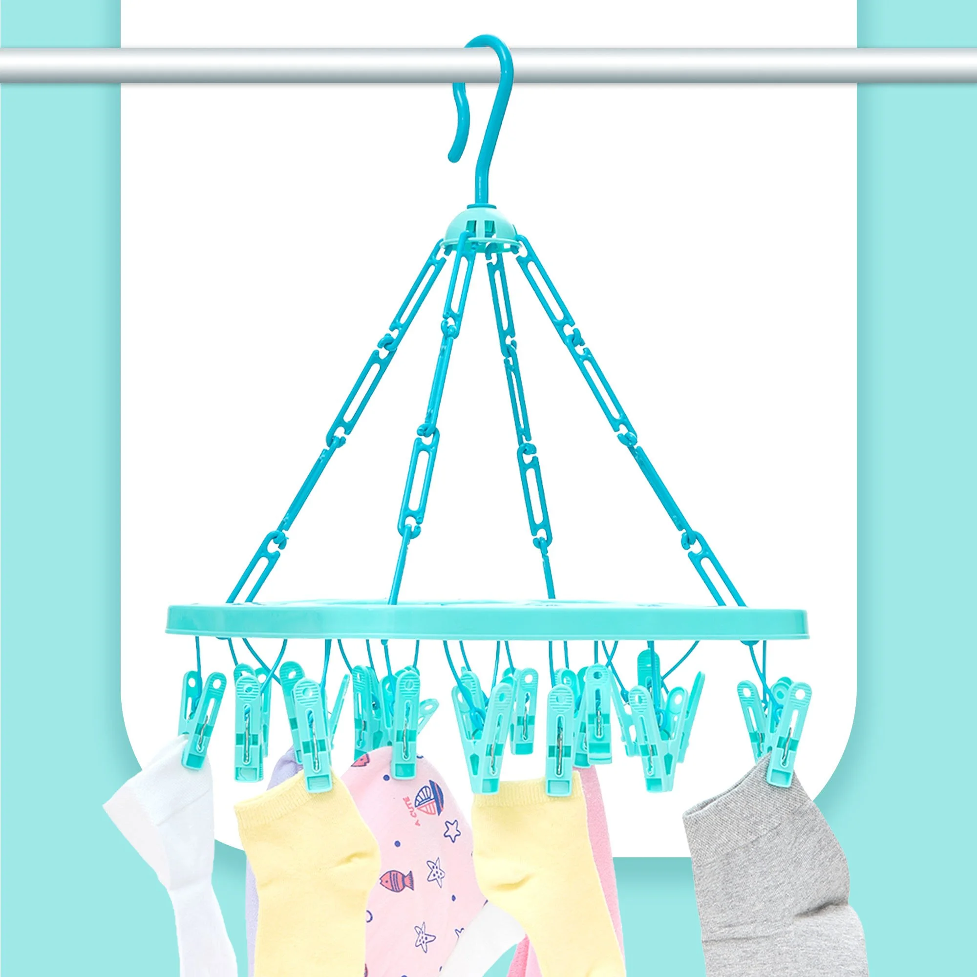Close-up of a clothing hanger with multiple colorful socks hanging on it, set against a colorful background.