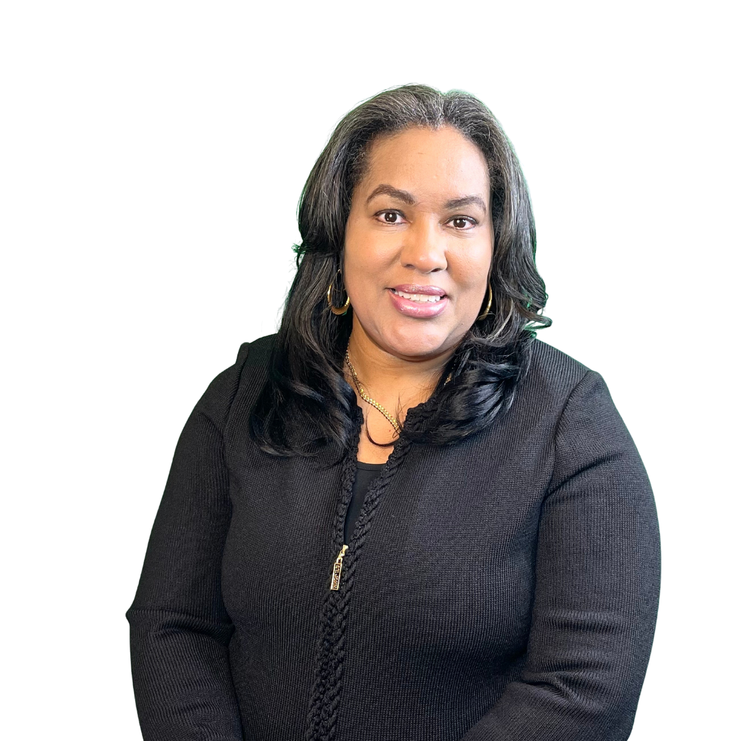A woman with shoulder-length black hair, wearing a black blazer, gold hoop earrings, and a gold necklace, smiling at the camera.