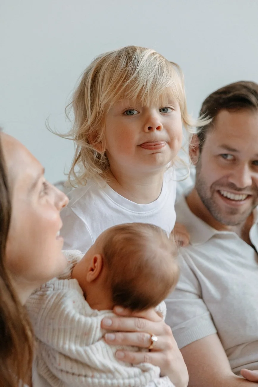 family-portraiture-child-pulling-funny-face.001.jpg