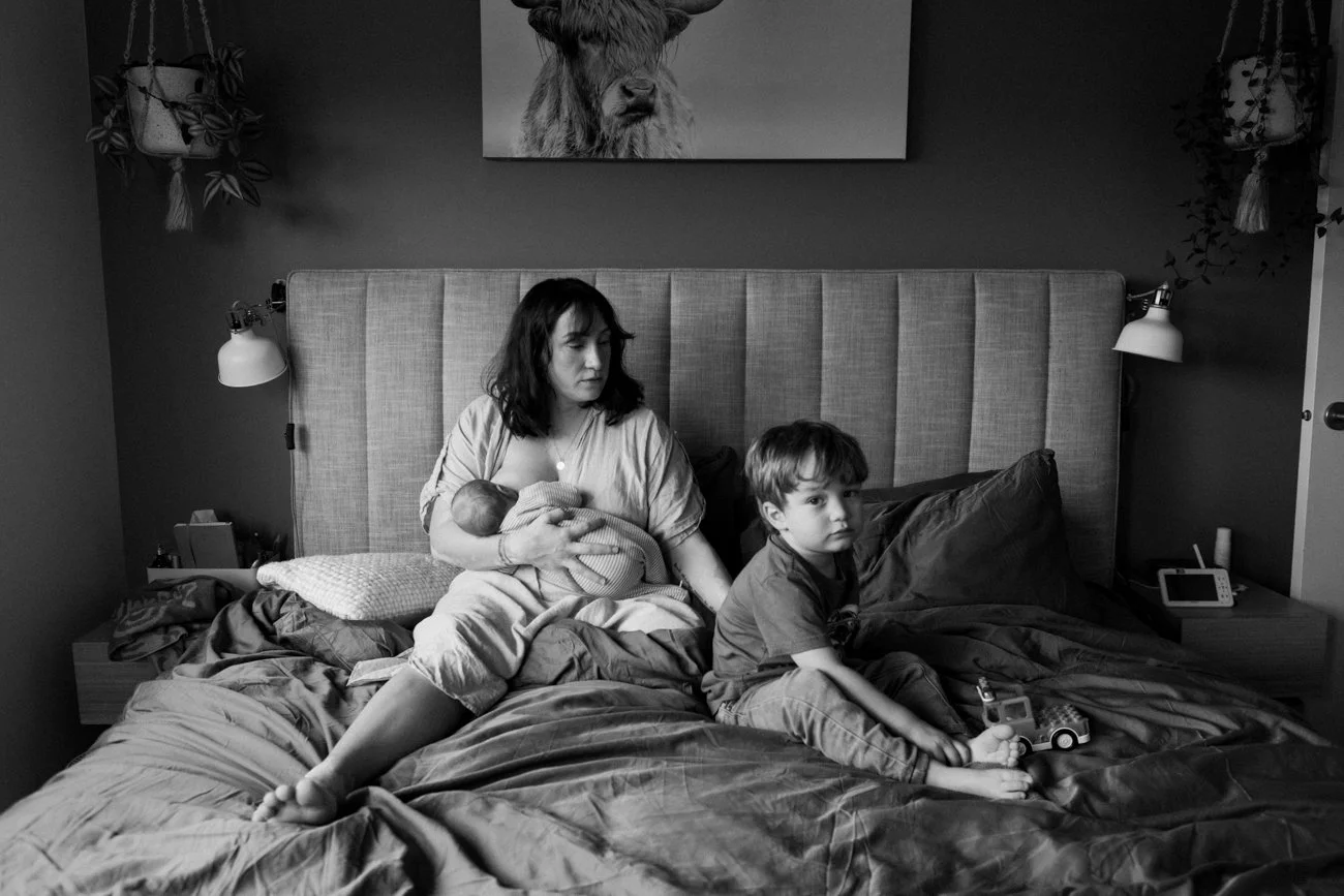 family-portraiture-family-resting-on-bed.001.jpg