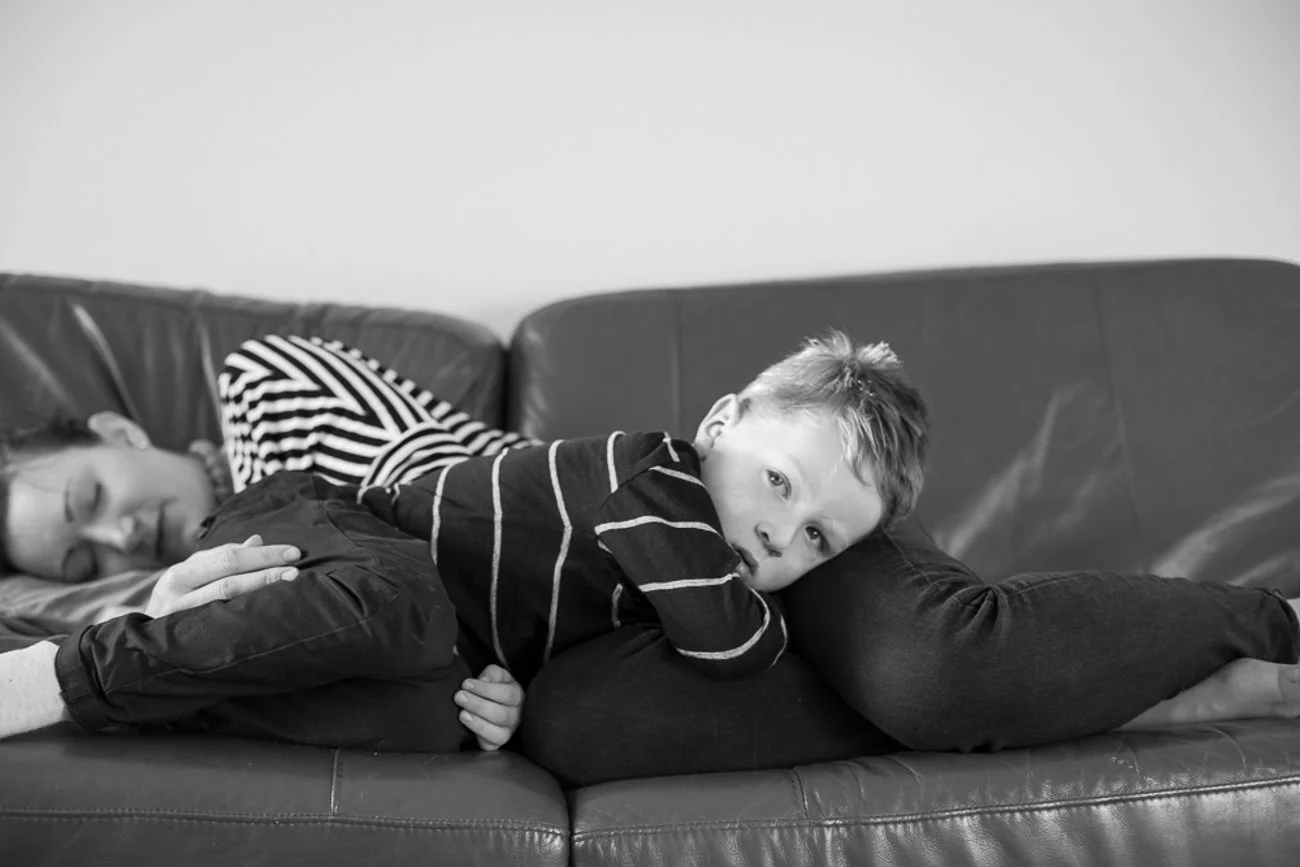 family-portraiture-mother-son-asleep-on-couch.001.jpg