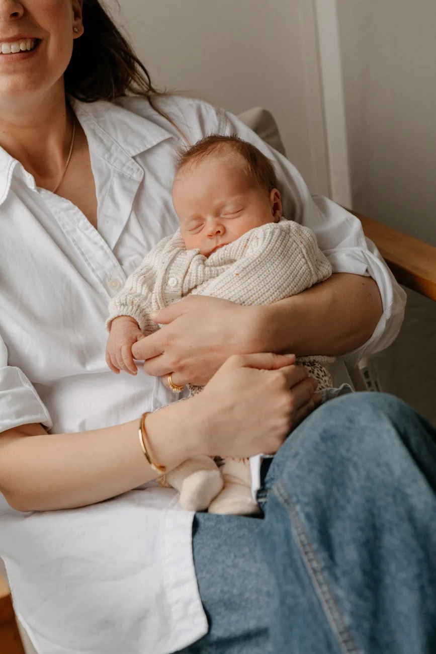 family-portraiture-mother-newborn-in-lap.001.jpg