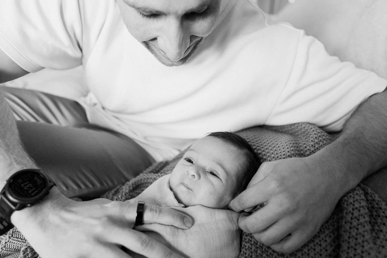 family-portraiture-father-holding-newborn.003.jpg