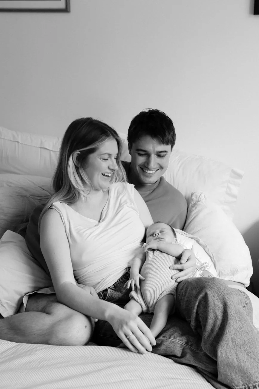 family-portraiture-mother-father-newborn-laughing.001.jpg