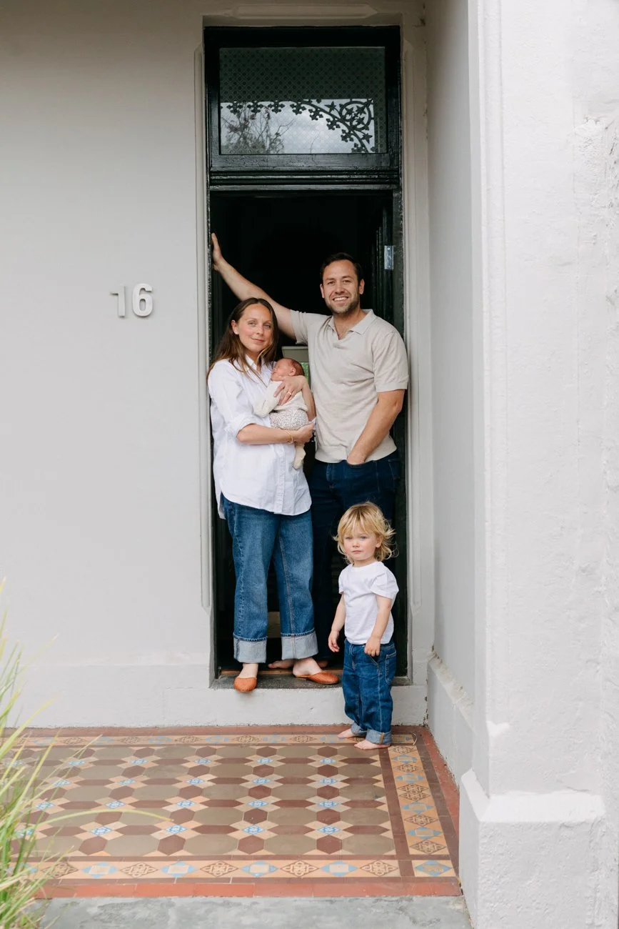family-portraiture-family-standing-in-frontdoor.001.jpg