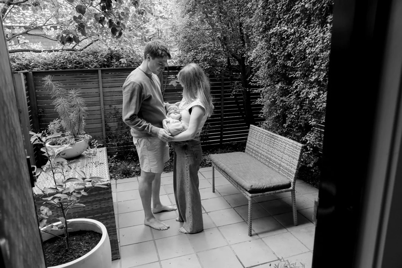 family-portraiture-mother-father-with-newborn-courtyard.001.jpg