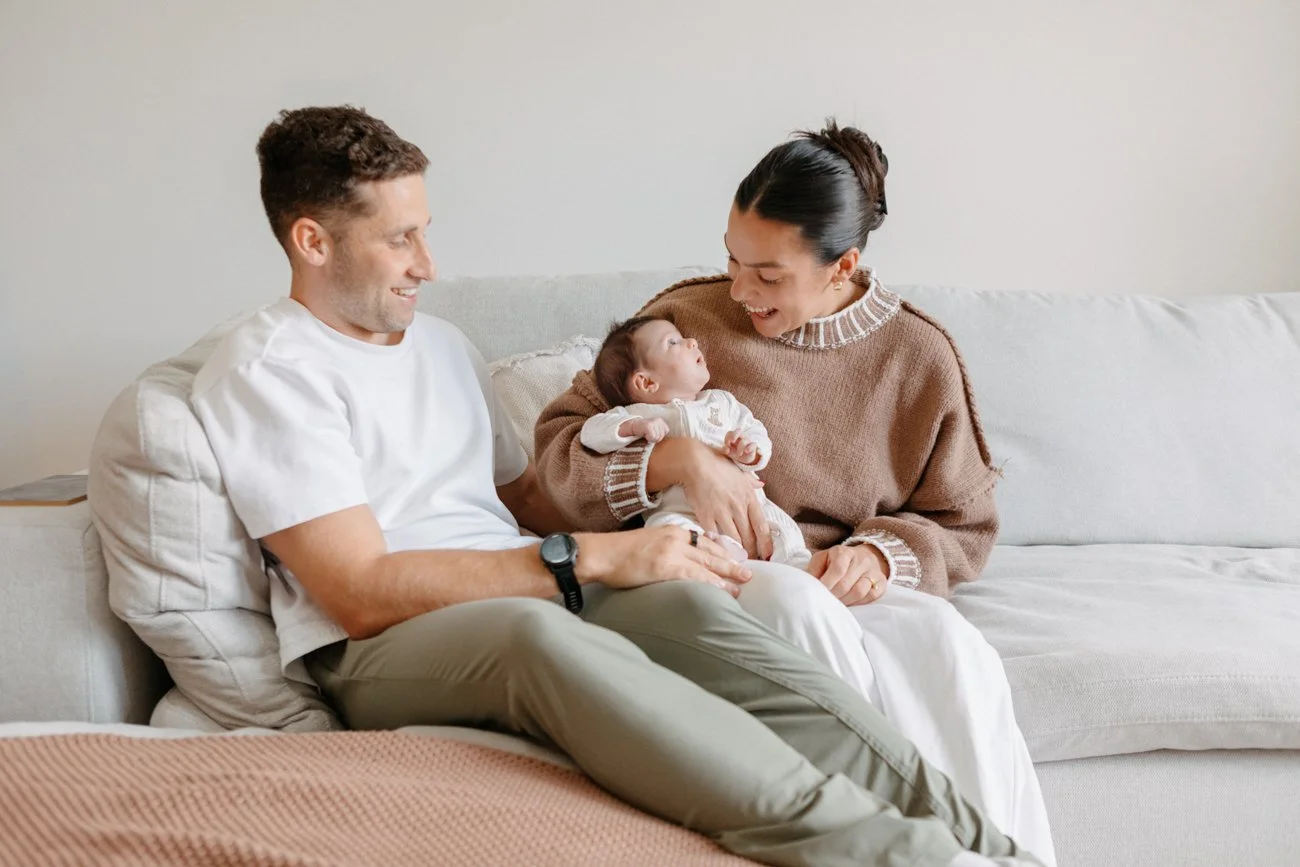 family-portraiture-mother-father-newborn-couch.001.jpg