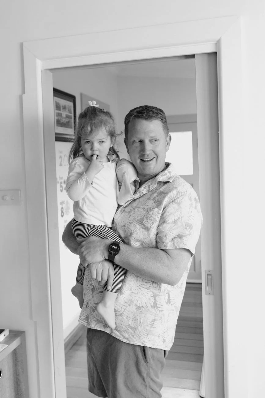 family-portraiture-father-holding-daughter.001.jpg