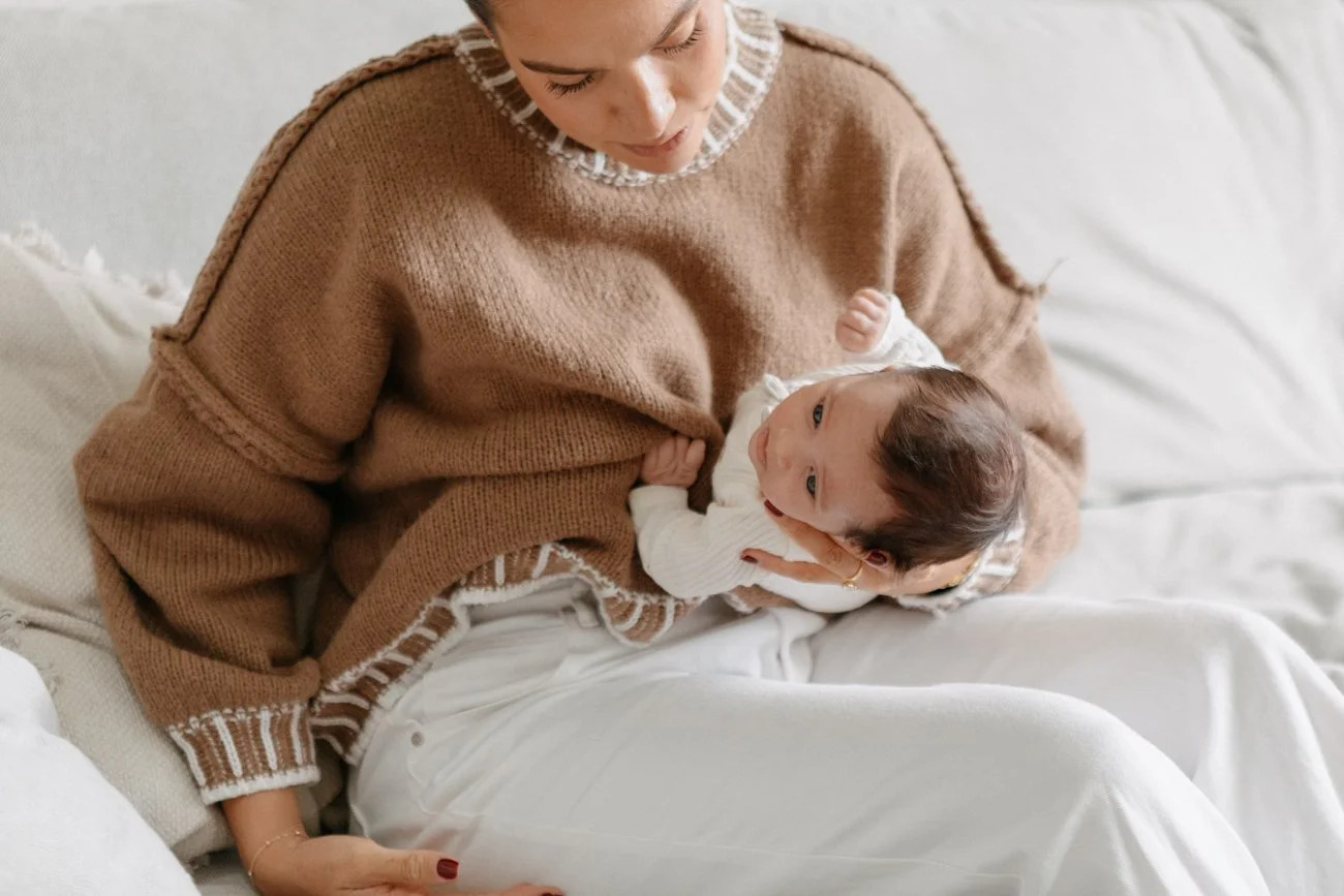 family-portraiture-mother-holding-newborn.007.jpg