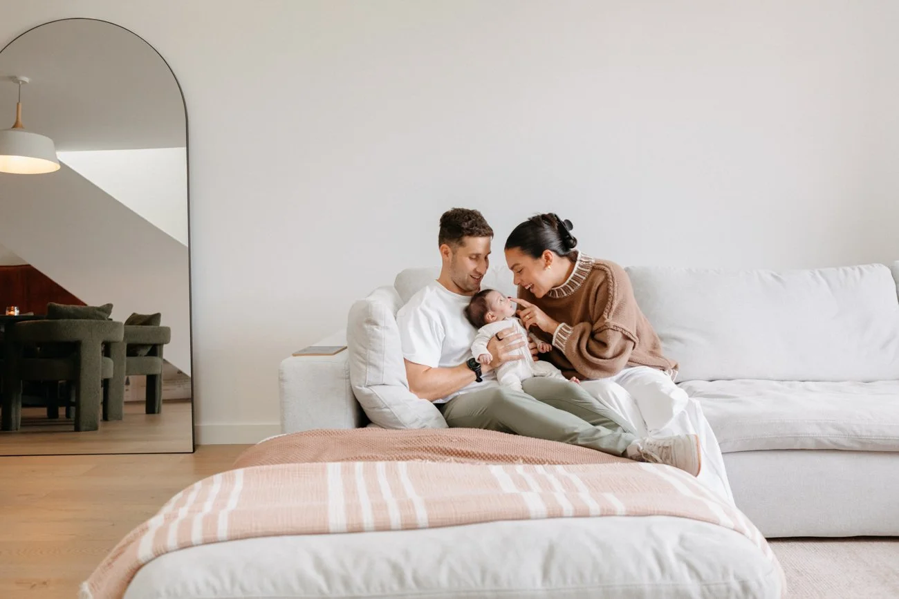 family-portraiture-mother-father-newborn-couch.002.jpg
