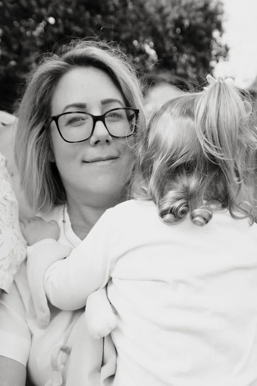 family-portraiture-mother-holding-daughter.002.jpg