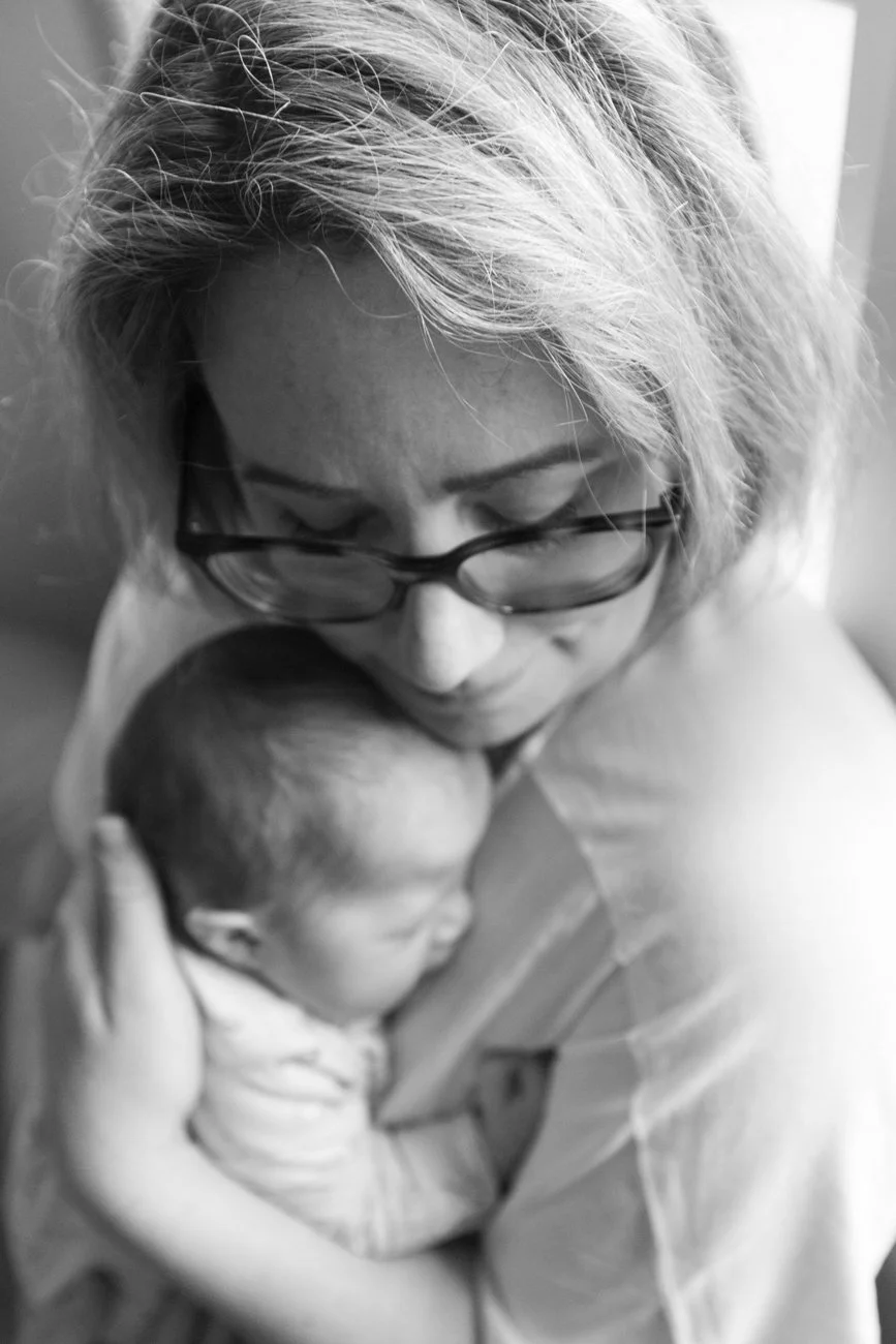 family-portraiture-mother-embracing-newborn.002.jpg