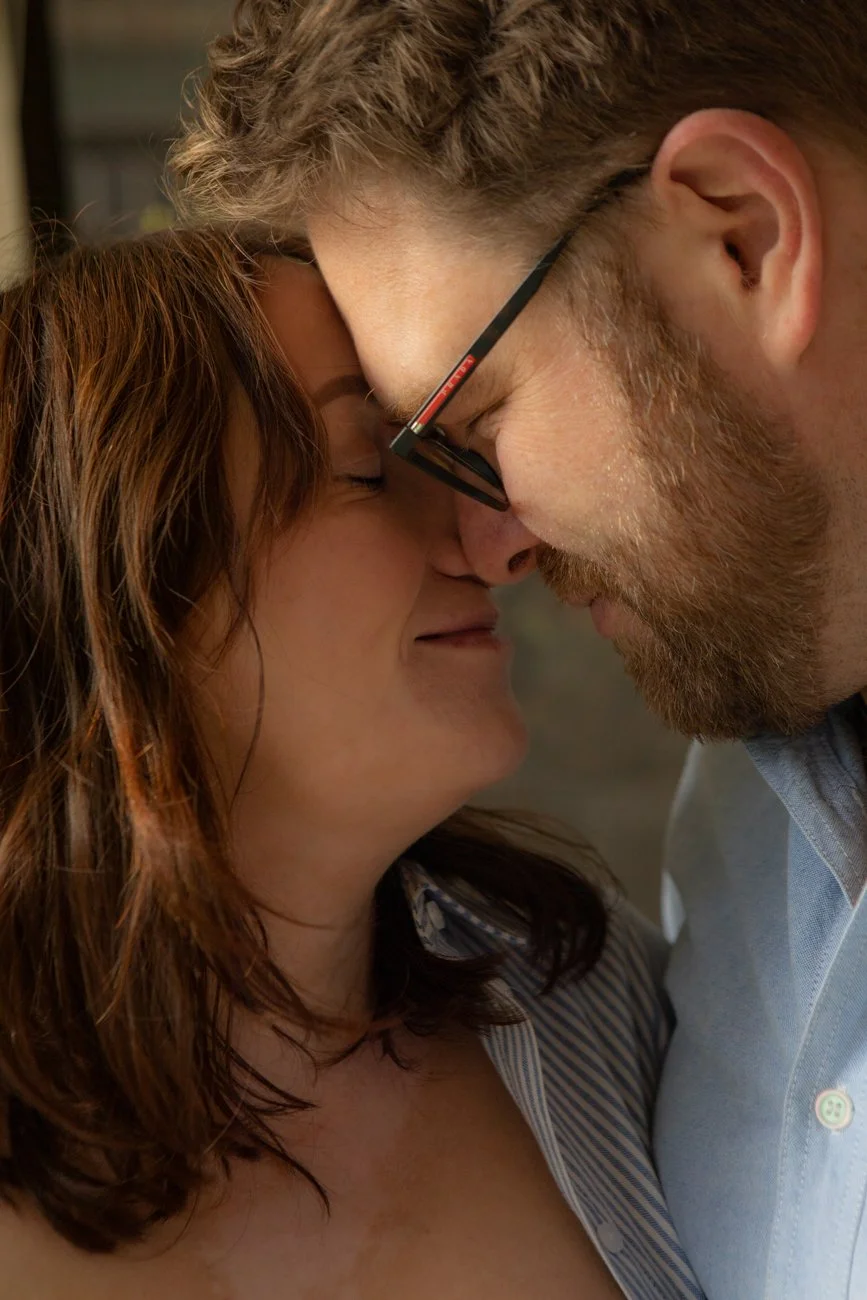 family-portraiture-mother-father-nose-touch.001.jpg