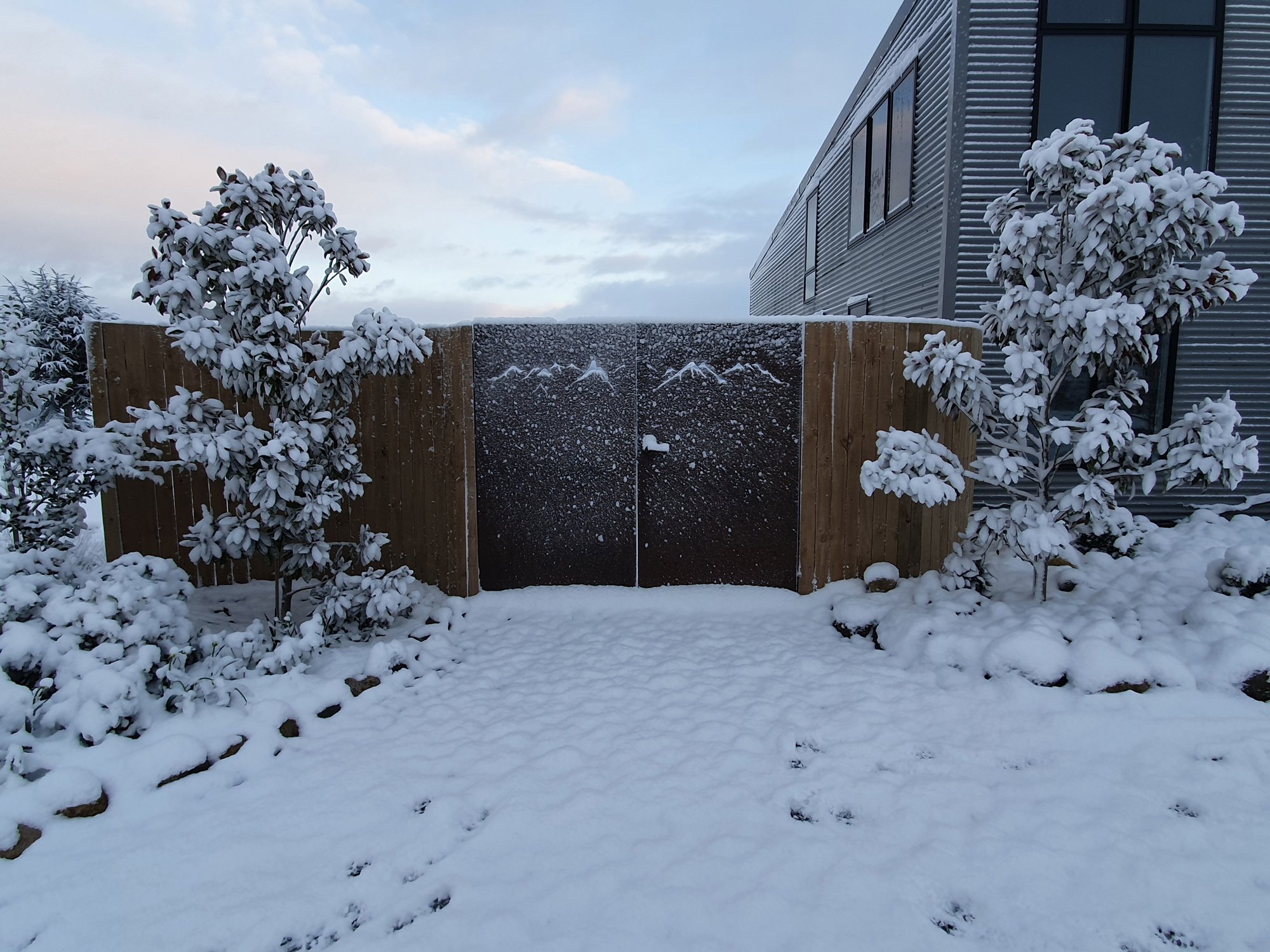 snow on corten gates