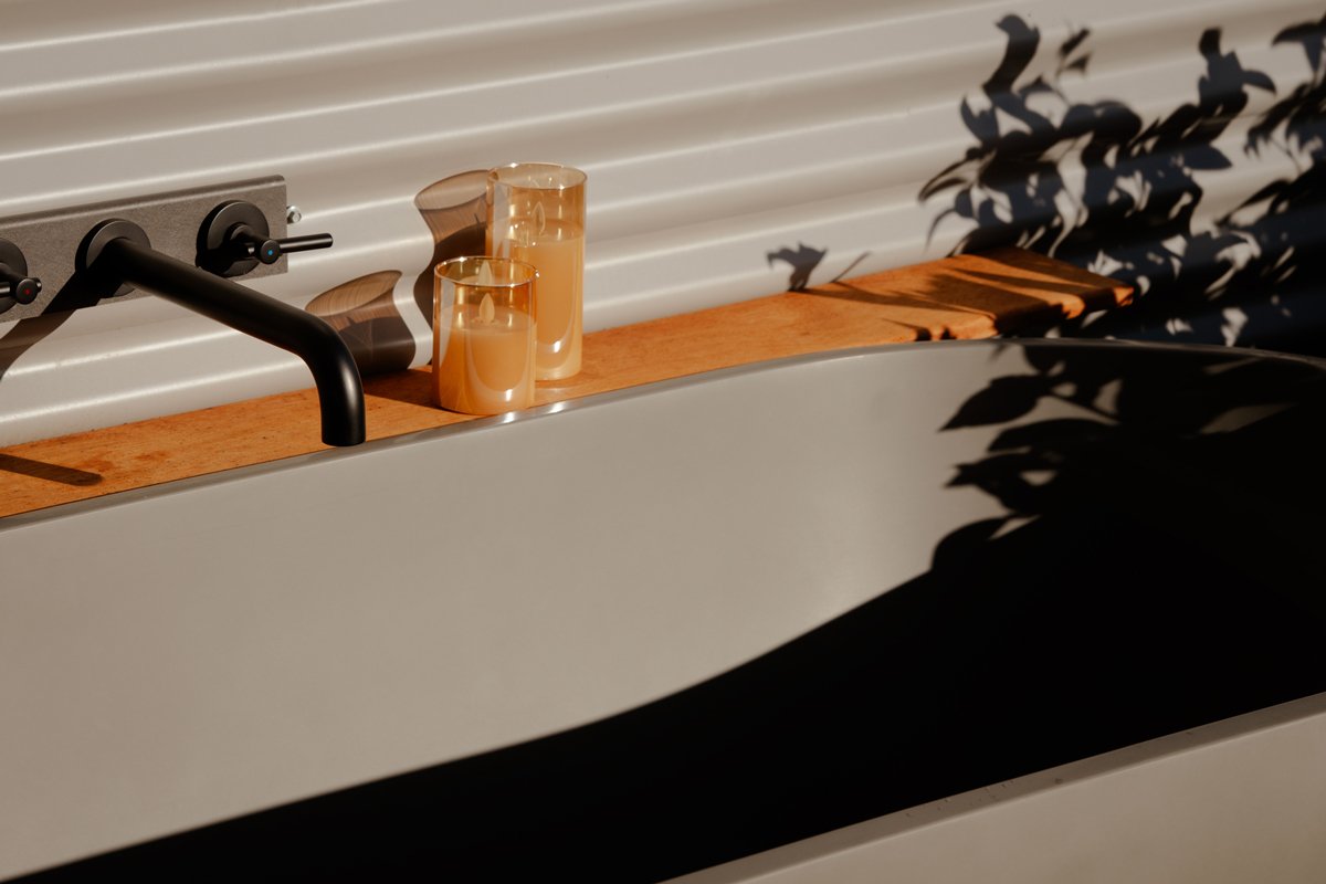Outdoor bath at Maunga Tipu, designed for a calm, self-paced experience