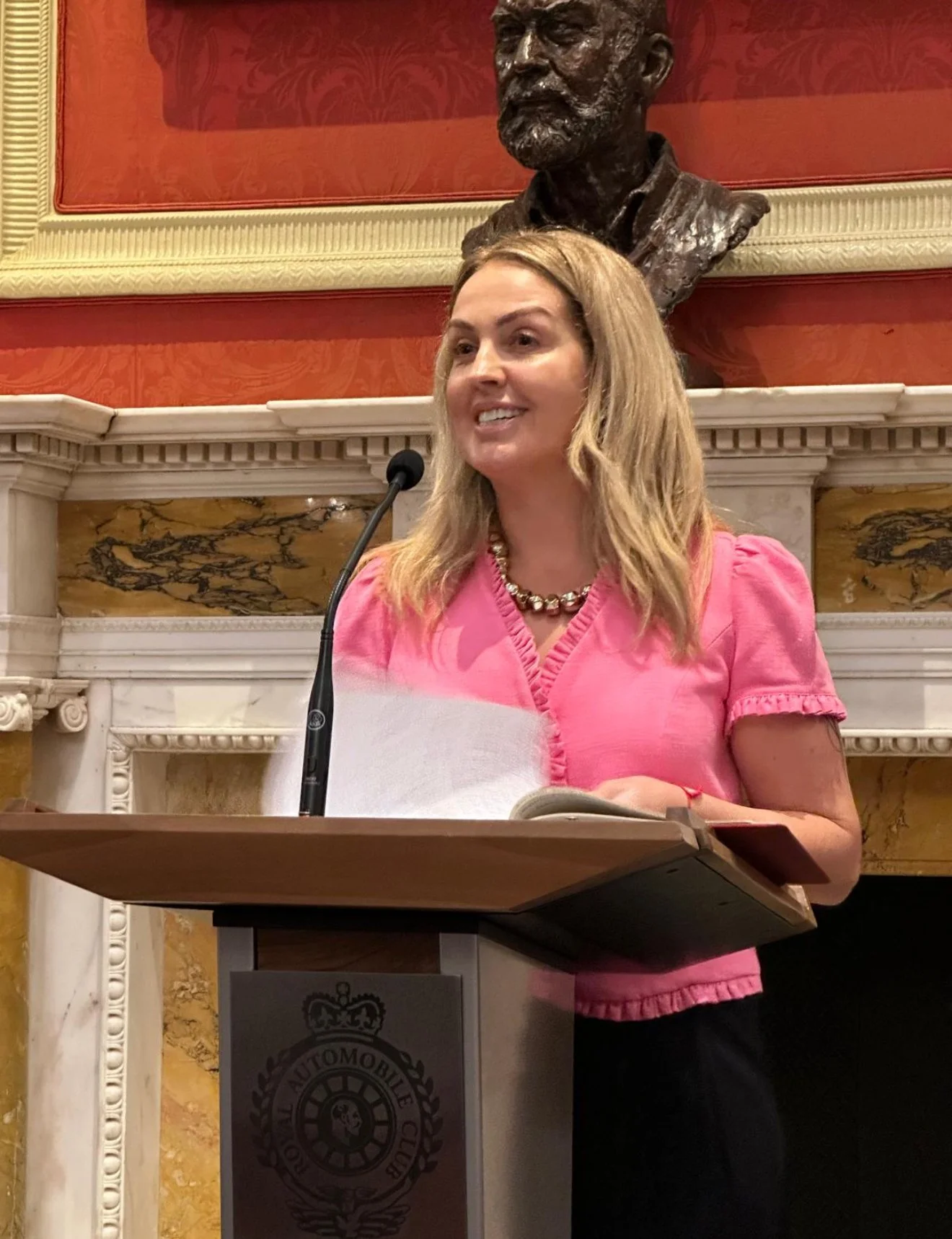Louize Clark speaking at the Royal Automobile Club, London, on the impact AI on jobs