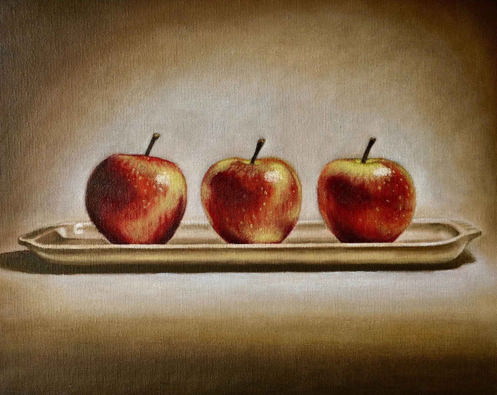 A4. trois pommes sur un plateau.jpg