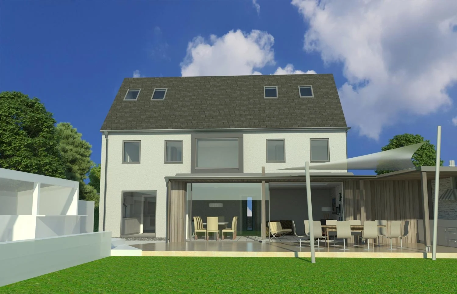 A modern house with a gray steep gabled roof, white exterior walls, and large windows. There is a patio with outdoor furniture and a green lawn in the foreground, with trees and a partly cloudy sky in the background.
