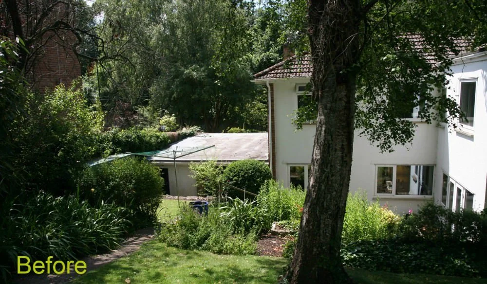 A garden with a large tree in the foreground, bushes, and plants. A white house with multiple windows and a sloped roof is visible. The word 'Before' is written in yellow text in the bottom left corner.